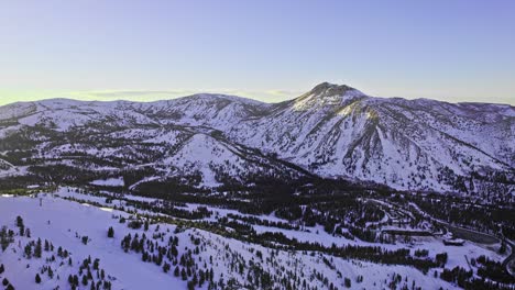 Aerial-view-mountain-snowy-landscape,-California-Lake-Tahoe-area