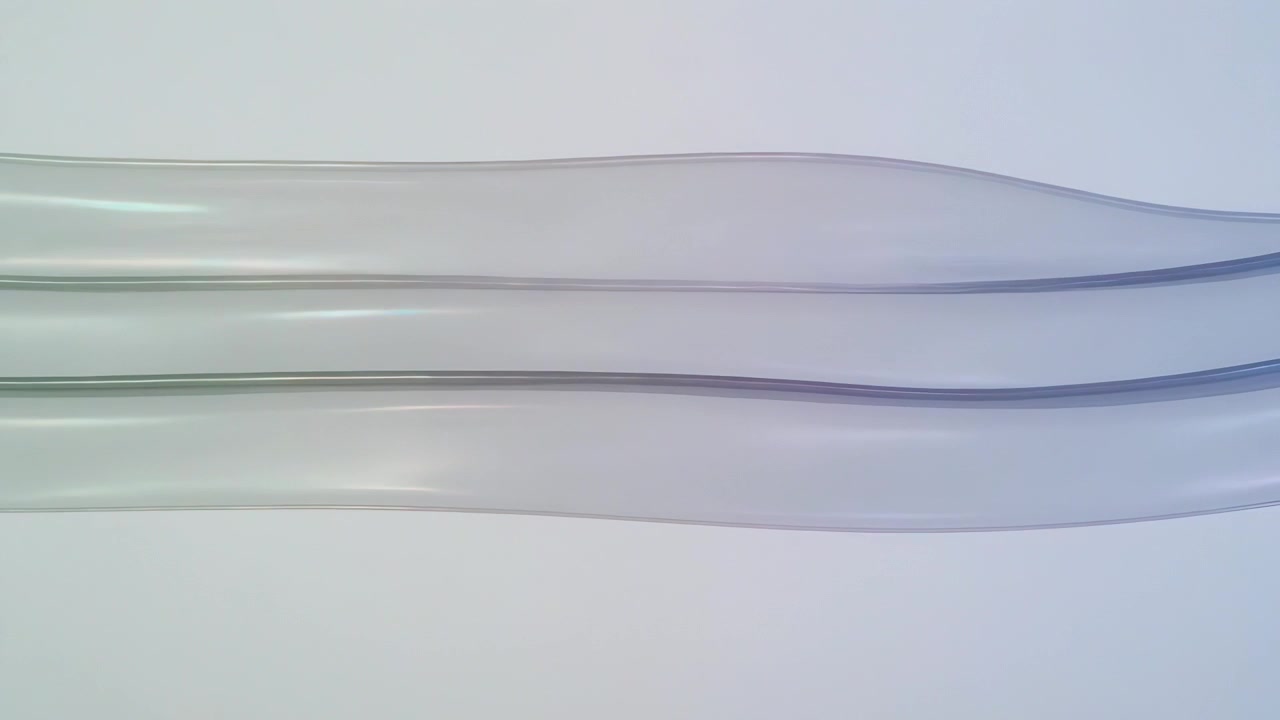 Playback starting three translucent ribbons shifting undulating across studio backdrop for rhythm