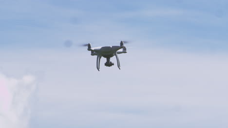 remote control drone in flight against blue sky