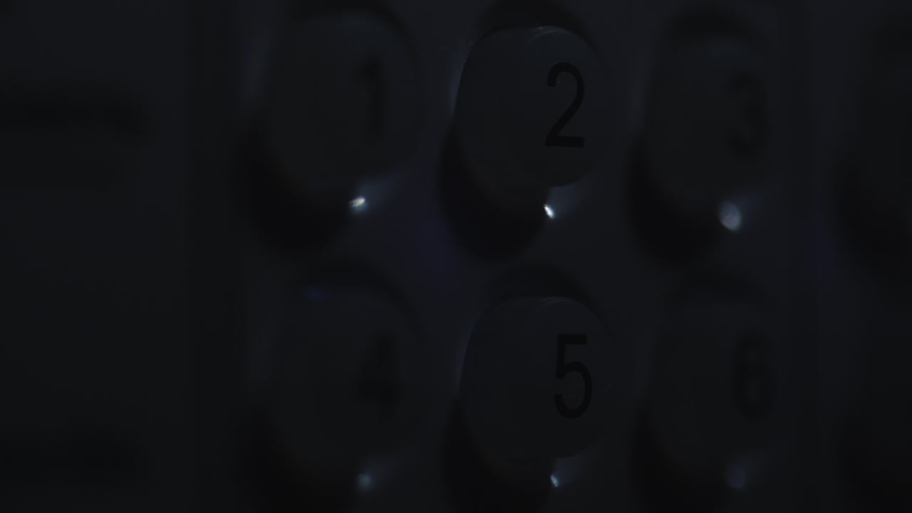 A person enters a pin code on a backlit keyboard 4