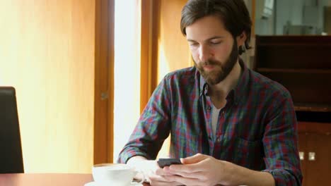 Student-using-his-phone