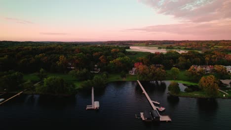 aerial view of lake houses at sunset