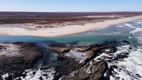 remote beach and jagged west coast shoreline at olifants river estuary