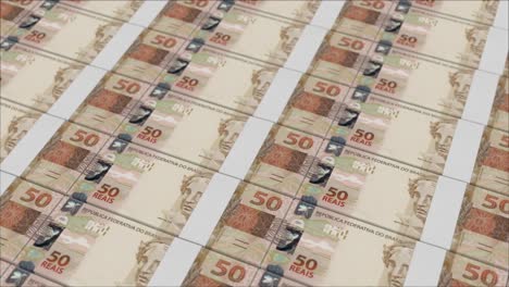 impresión de billetes de 50 reales brasileños por una imprenta de dinero