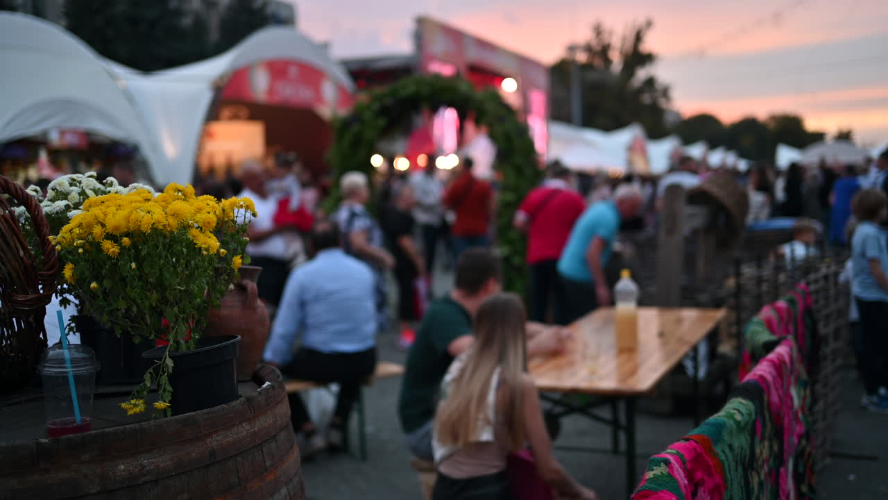 Chisinau, Moldova - October 5, 2022: People walking on the streets of the city centre on National Wine Day