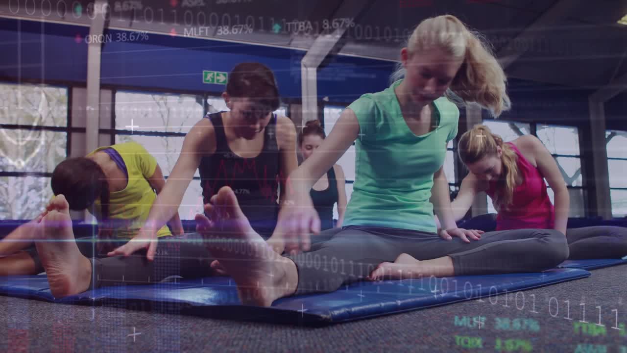 Women in fitness on cue reaching foot on blue mats deepening stretch, binary overlays around group