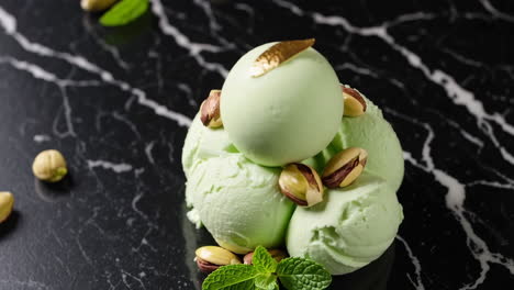 delicious pistachio ice cream with gold leaf and nuts
