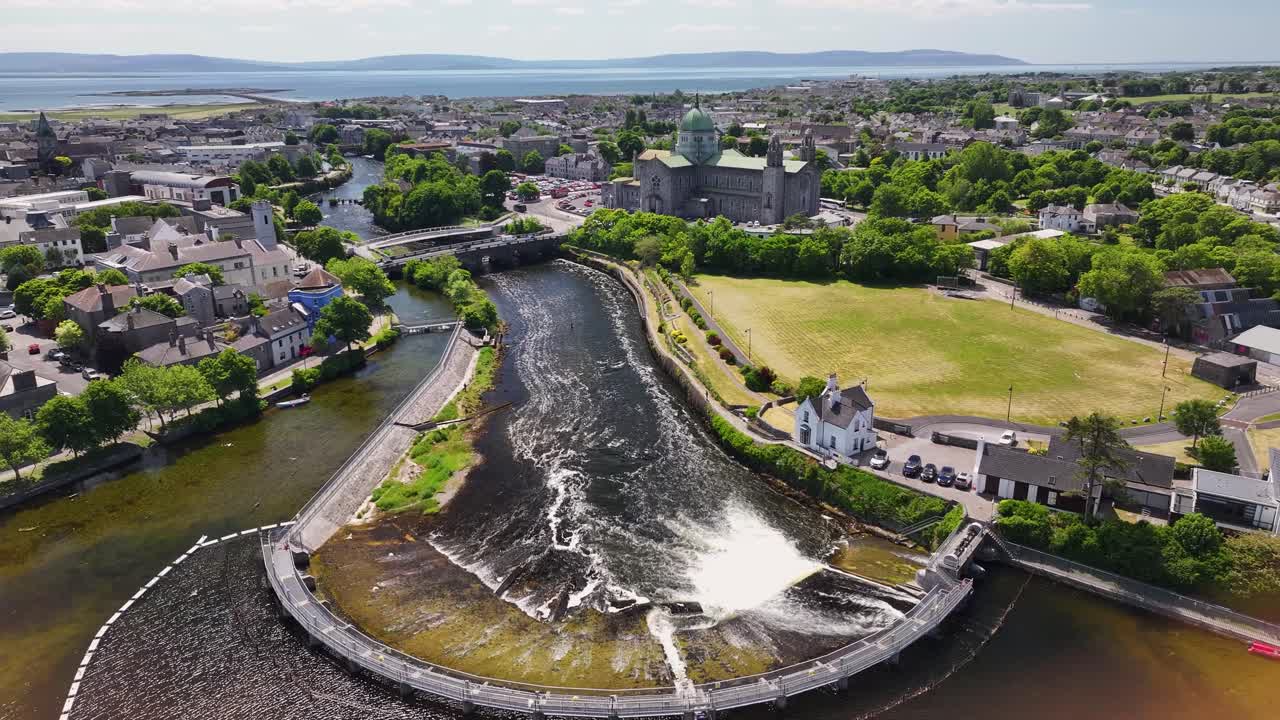 Galway Cathedral and river Corrib, aerial cinematic panorama. The Wild Atlantic Way, Ireland.