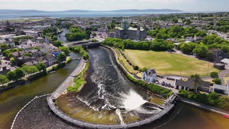 galway cathedral and river corrib, aerial cinematic panorama. the wild atlantic way, ireland.