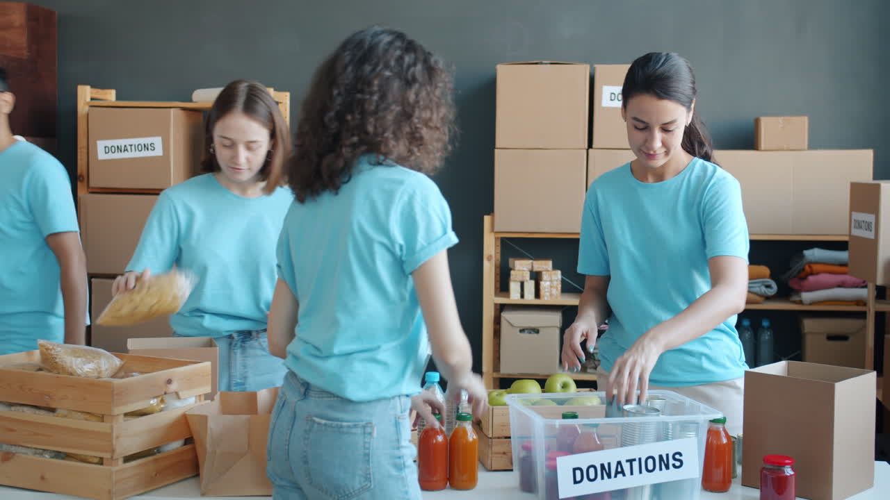 Volunteers Sorting and Packing Donations