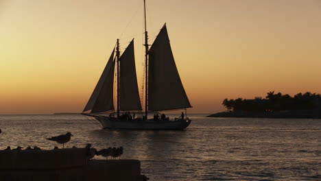 a beautiful sailing ship at sunset 1