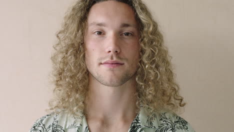 portrait of attractive young man close up of relaxed confident man