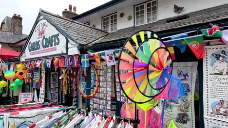 vibrant wind spinner outside a crafts shop