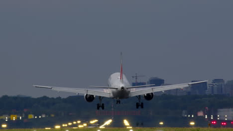 airplane landing on runway at airport