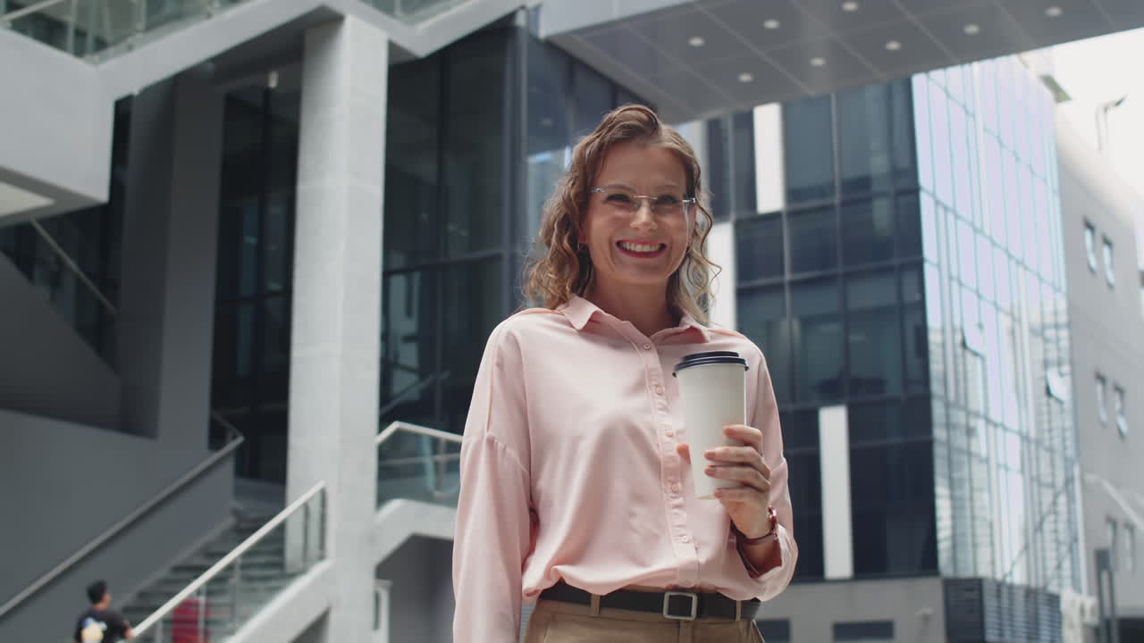 Portrait of Businesswoman with Cup of Coffee Outdoors