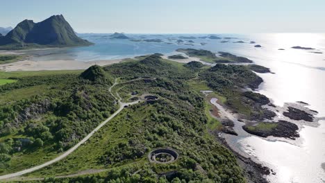 aerial footage of batterie dietl on engeløya, norway. a historic world war ii site now set on a peaceful island, surrounded by mountains and lapped by the sea