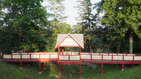 aerial flying backward from lovers retreat in roger williams park, rhode island