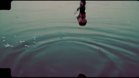 person standing in a calm lake