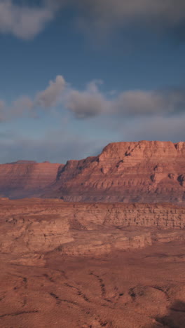 a vast, red rock canyon in the desert.