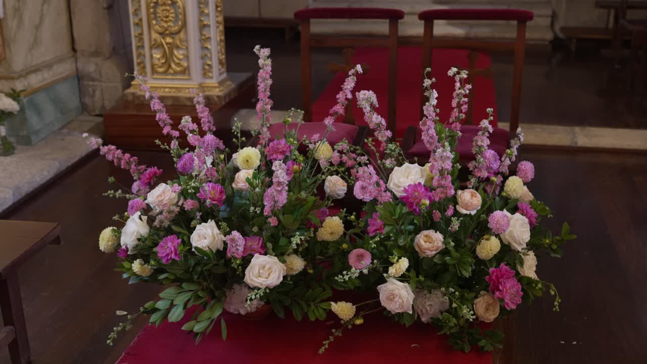 close up of colorful floral arrangement for wedding ceremony in Portugal