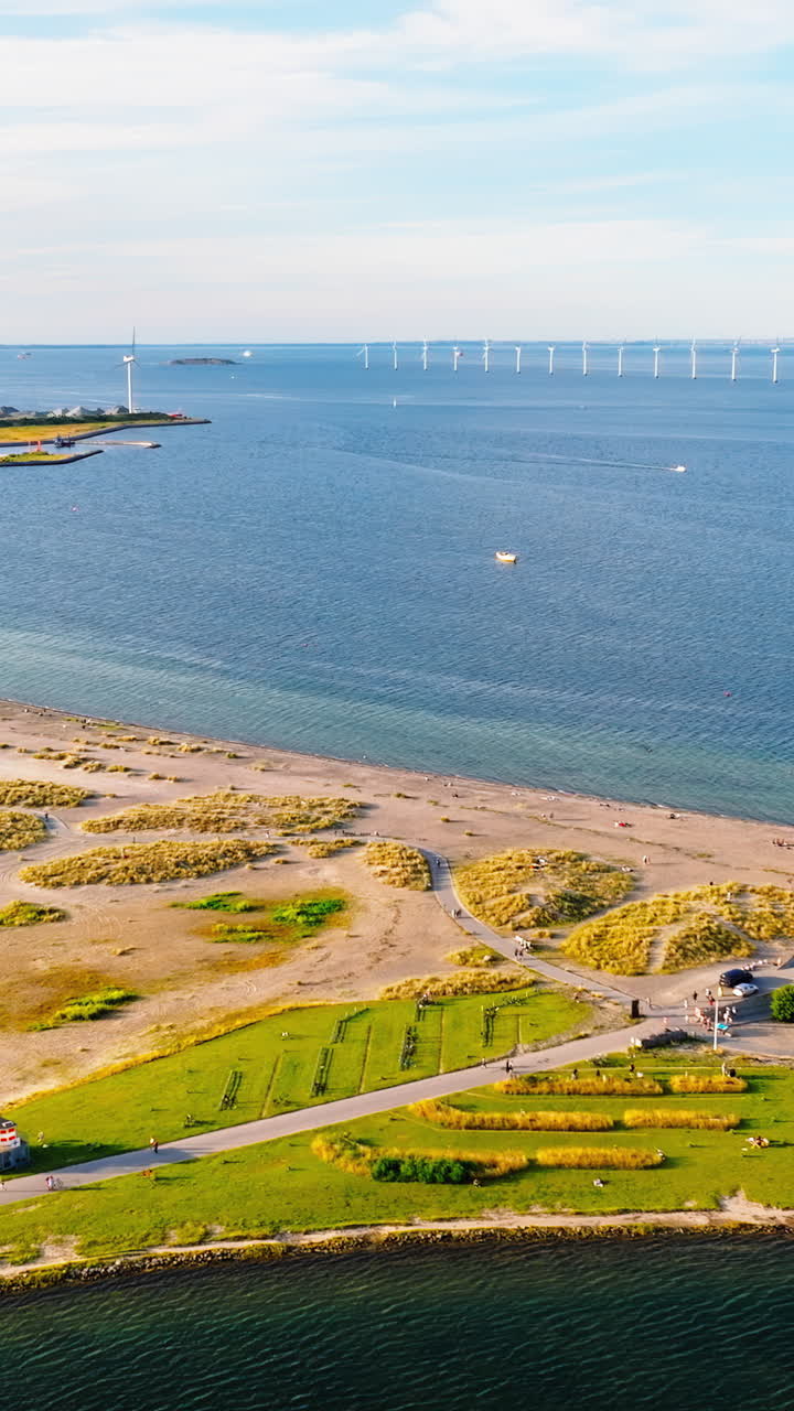 Aerial drone view of Amager Beachpark seaside public park in Copenhagen, Denmark. Vertical