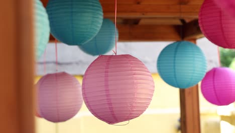 a collection of colorful paper lanterns hanging as decorations