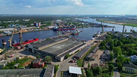 Panoramic-aerial-view-of-Riga-harbor-with-vessels-and-buildings