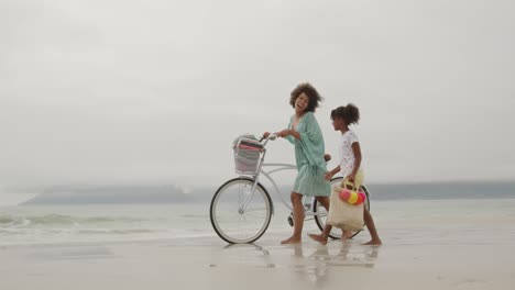 family enjoying free time by the sea