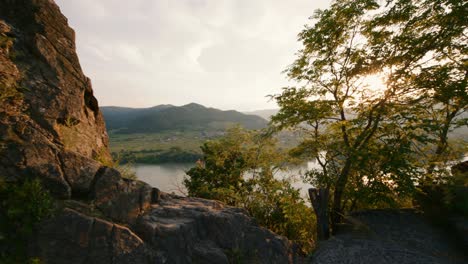 Amazing-view-from-the-mountain-peak-overlooking-the-medieval-Durnstein-castle-ruin-and-town-in-Wachau-valley-Lower-Austria-along-the-river-Danube