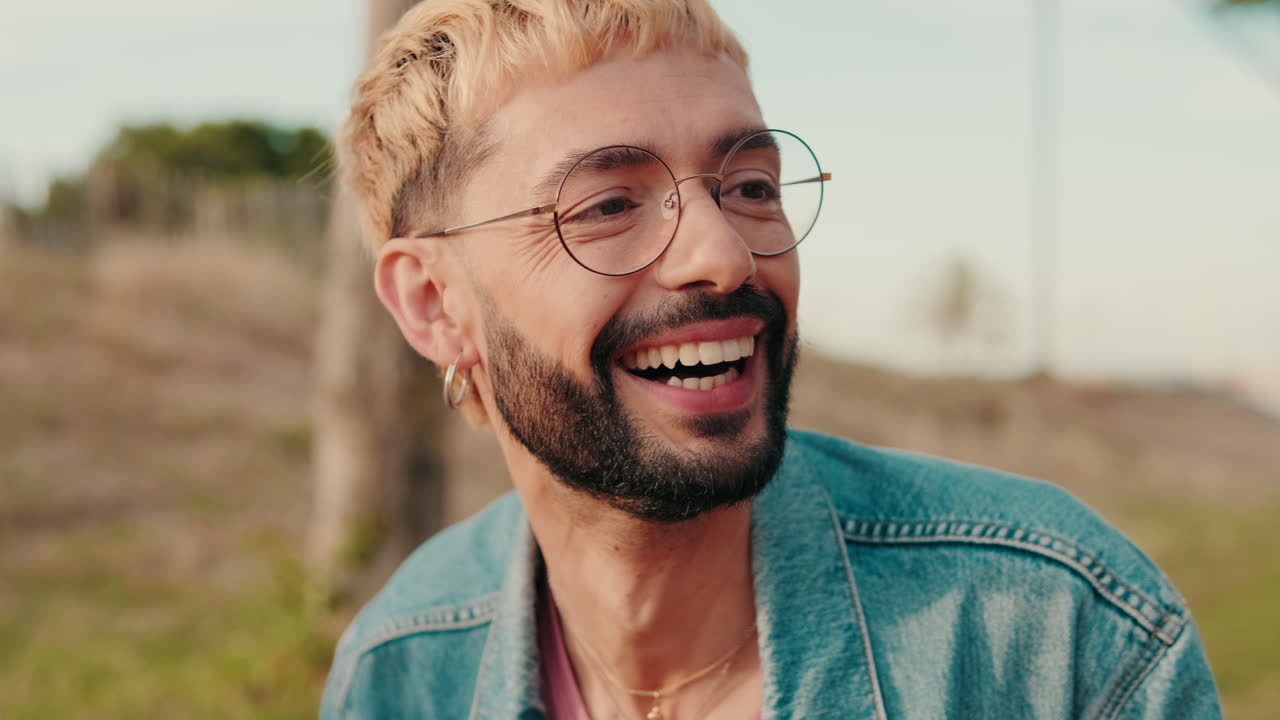 Friends Enjoying a Sunny Picnic Outdoors, focus on the boy in glasses