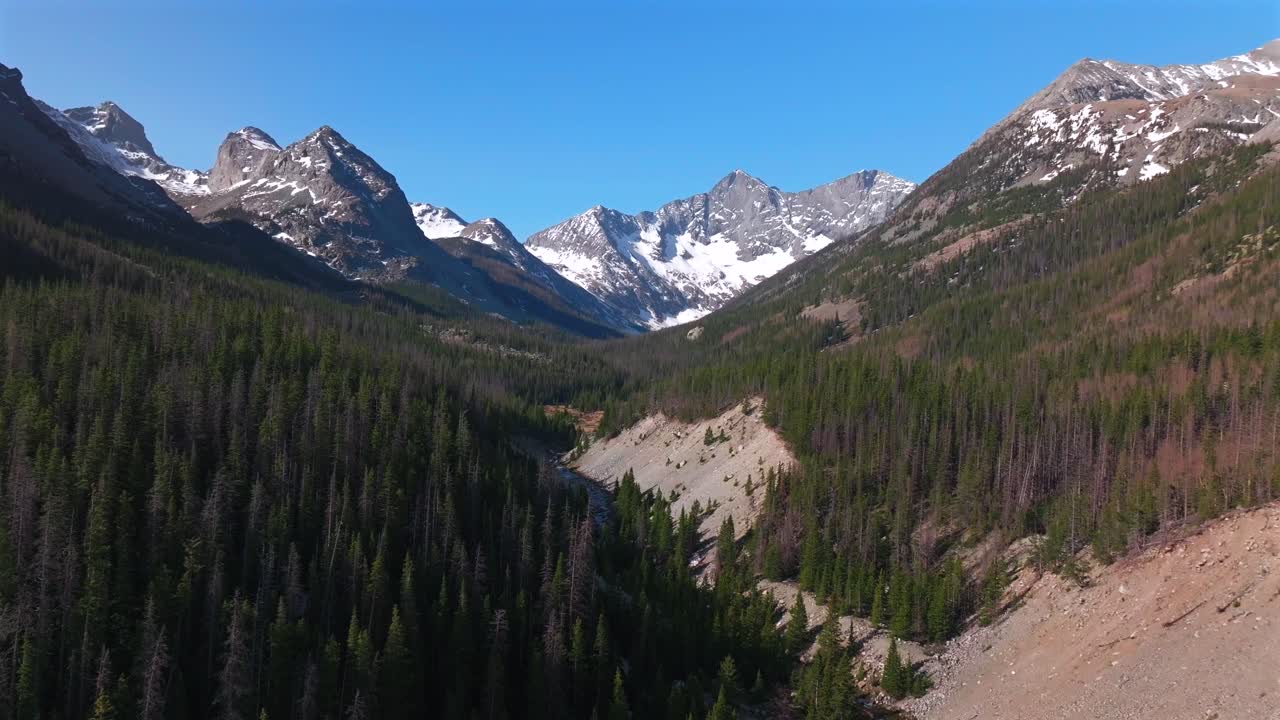 Huerfano River valley Blanca Peak Mt Mount Lindsey Lily Lake trail Sangre de Cristo Range Colorado aerial drone spring Summer San Isabel forest Iron Nip ple Rocky Mountains blue sky sunny forward pan