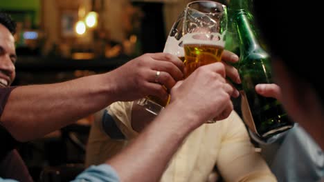 happy men making a toast in the pub