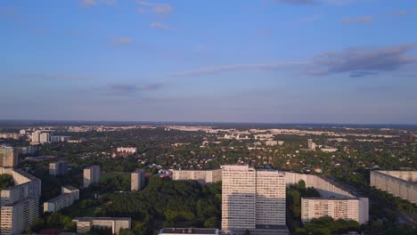 perfect aerial top view flight
panel system building, prefabricated housing complex, berlin marzahn east germany golden hour 2023