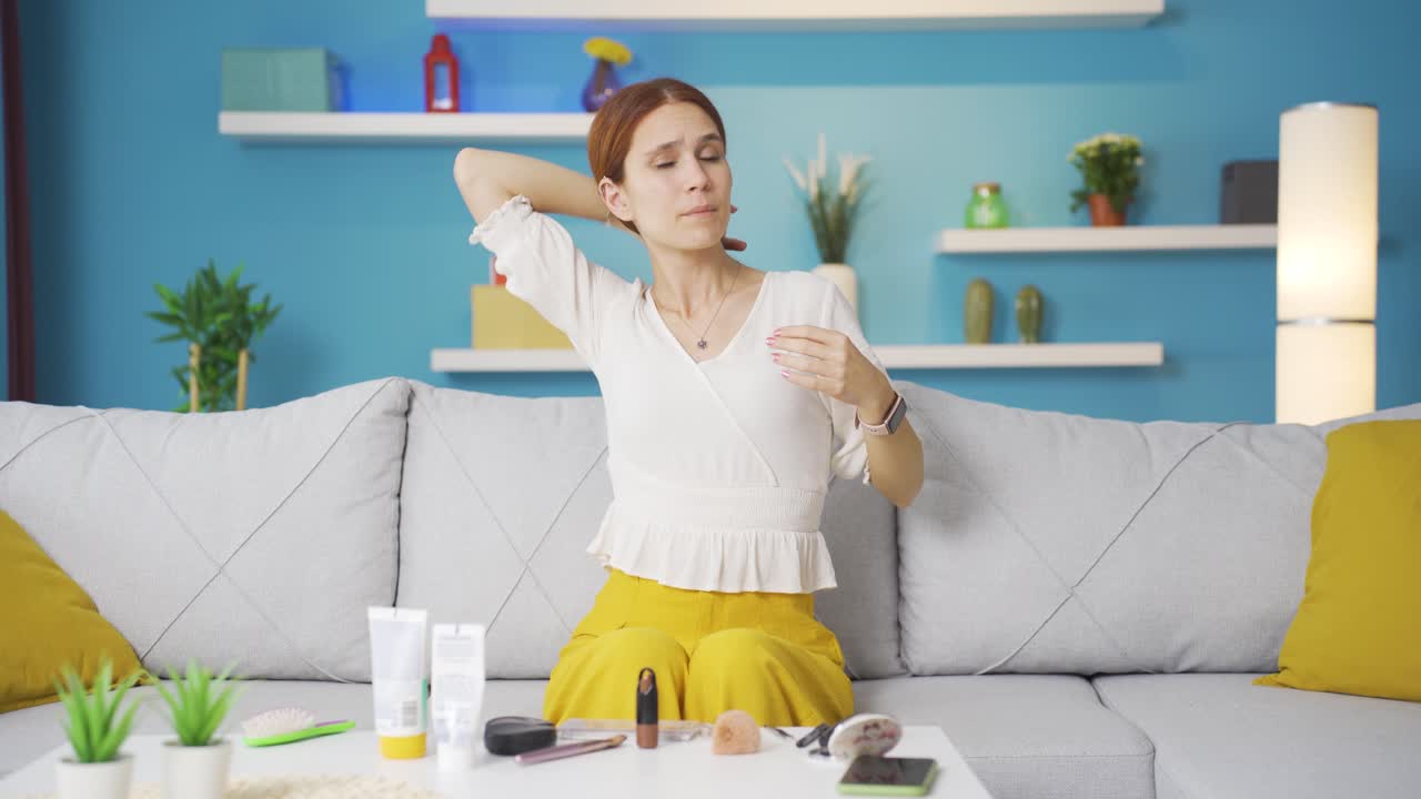 The young woman who doesn't like her hair. Depressed and unhappy.