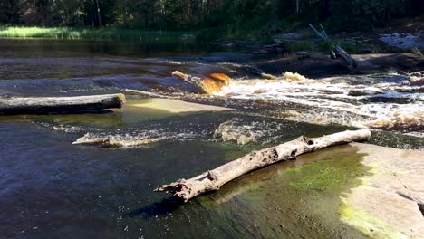 Canadian-Boreal-shield-Etomami-river-flowing-over-Makik-Falls-in-slow-motion-Northern-Manitoba-Canada