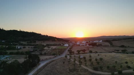 aerial view of a serene village landscape at sunset in rural portugal