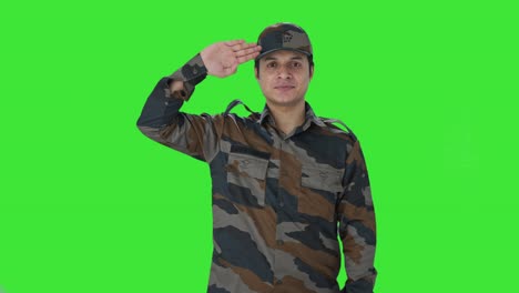 happy indian army man saluting green screen