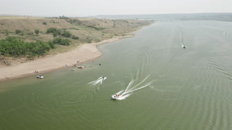 speed boats and jetski at lake diefenbaker in saskatchewan landing, canada