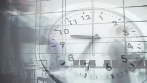 Animation-of-ticking-clock-against-time-lapse-of-businesspeople-walking-at-office