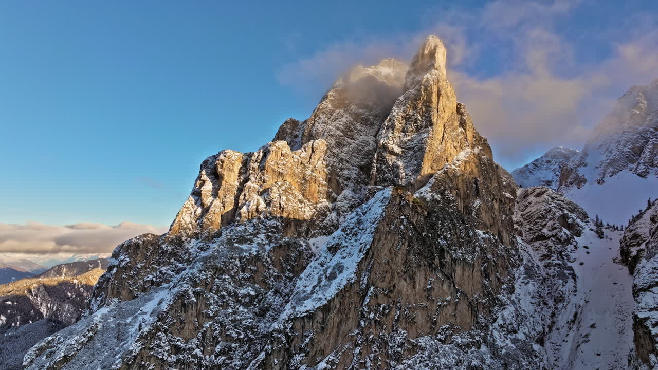 Aerial drone view of snow on the mountains in the Dolomites, Italy
