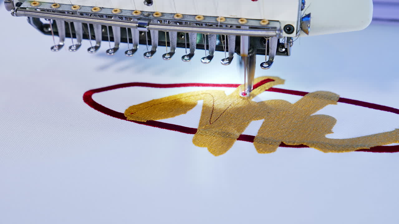 Industrial textile sewing machine. Fabric cloth stitching.