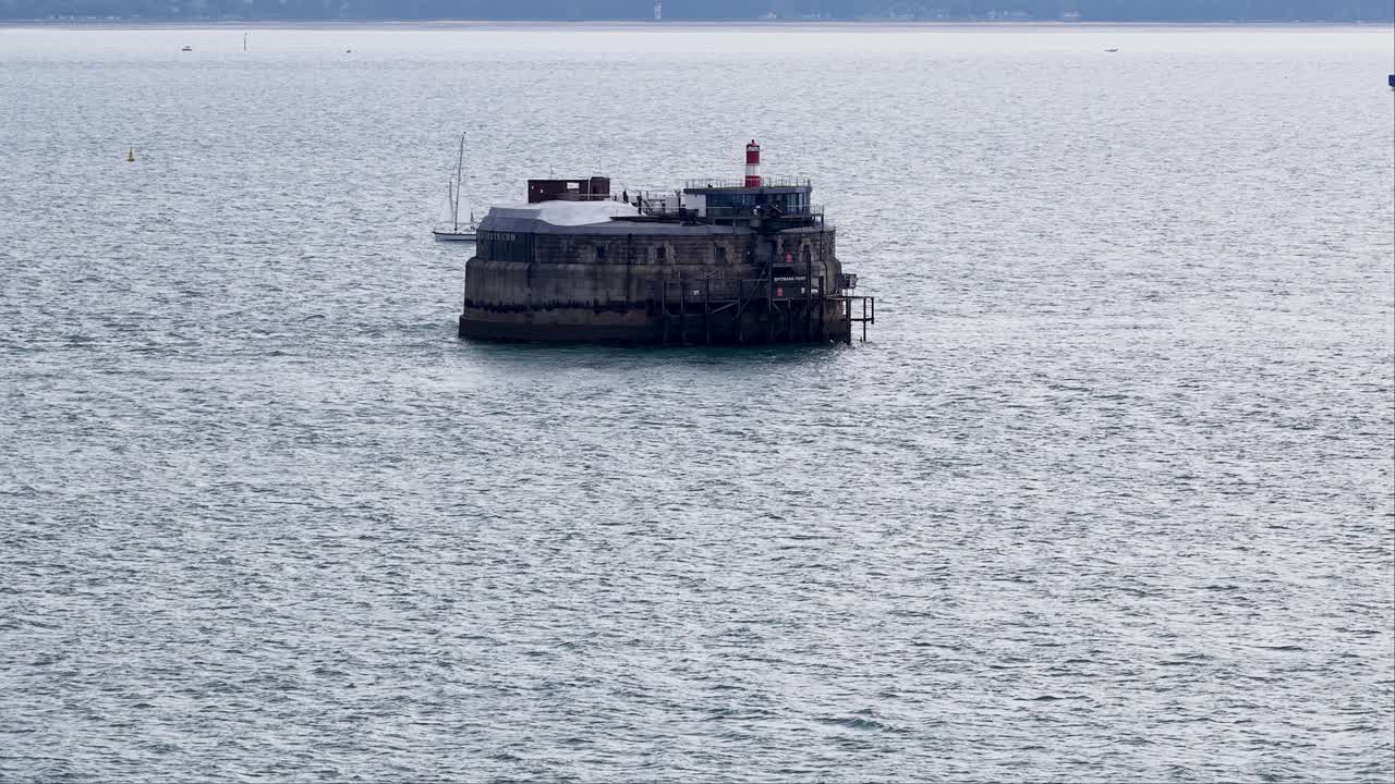 Spitbank fort aerial view with yacht sailing from behind the Portsmouth hotel retreat attraction