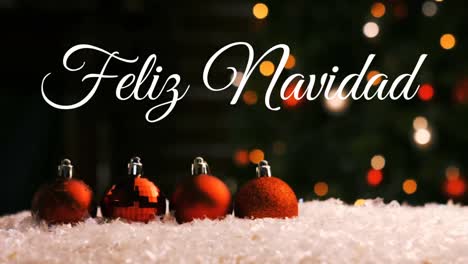 Feliz-Navidad-written-over-Christmas-baubles