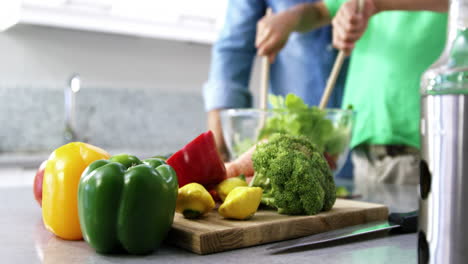 family preparing vegetables