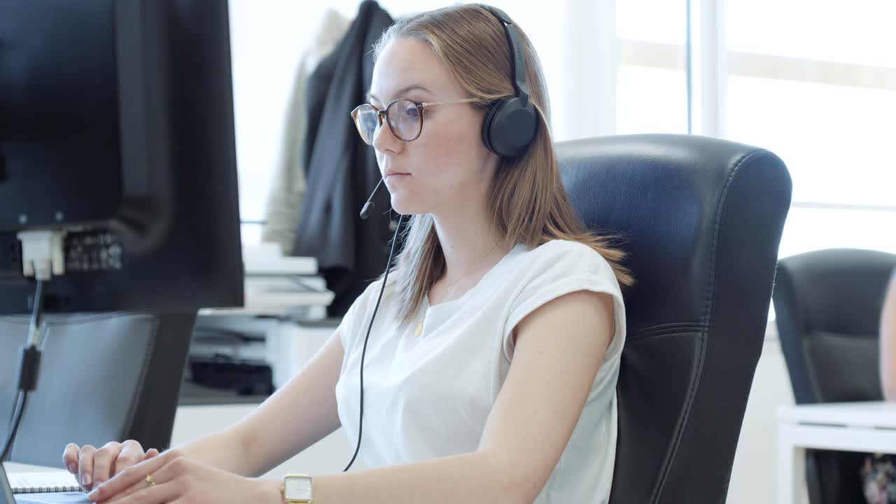 Woman working in call center office