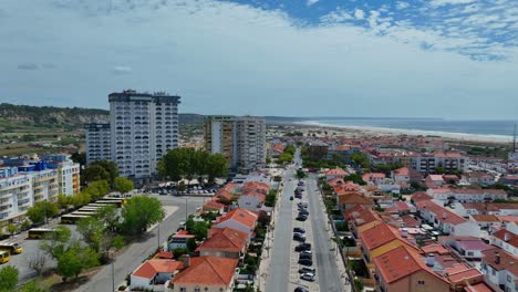 drone shot of avenida dom sebastiao in costa da caparica