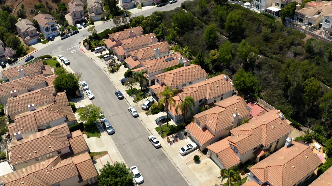 Aerial View of a Suburban Residential Neighborhood with Houses and Street