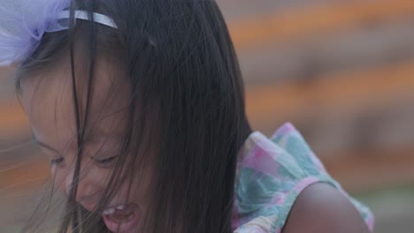 mother and daughter laughing