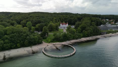 aerial of the infinite bridge with varna castle, aarhus, denmark