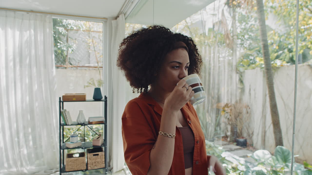 Relaxed Woman Enjoying Cup of Morning Coffee